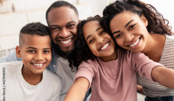 Portrait of african american family taking a selfie together at home